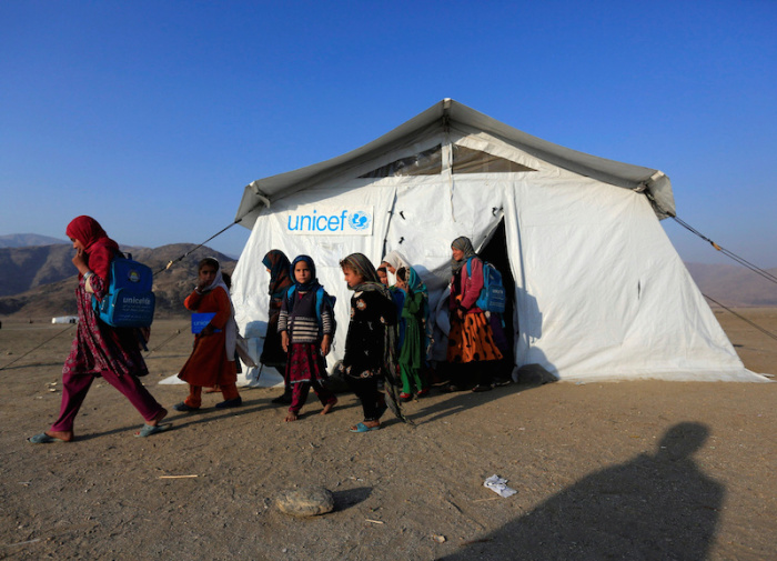 Afghan refugee children leave a class at a refugee camp on the outskirts of Jalalabad, Afghanistan, February 12, 2017. Picture taken February 12, 2017.