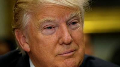 U.S. President Donald Trump listens during a meeting with teachers and parents on education at the White House.