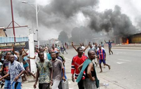 Congolese opposition supporters chant slogans during a march to press President Joseph Kabila to step down in the Democratic Republic of Congo's capital Kinshasa September 19, 2016.