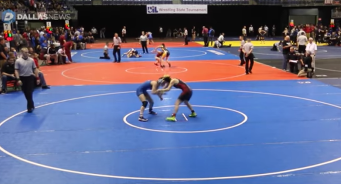 Mack Beggs (right) wrestles at the UIL Wrestling State Tournament in Texas, February 2017.