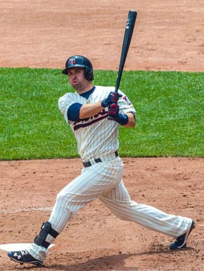 Minnesota Twins second baseman Brian Dozier swings the bat during a game in July of 2015.