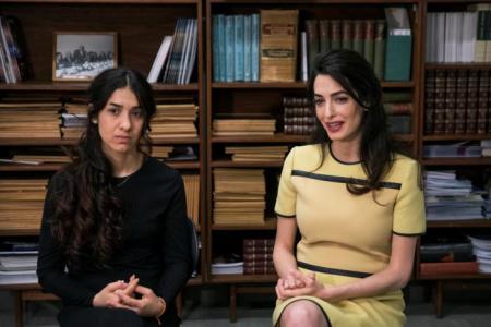 Yazidi survivor Nadia Murad (L) takes part in an interview with international human rights lawyer Amal Clooney at United Nations headquarters in New York, U.S. on March 9, 2017.