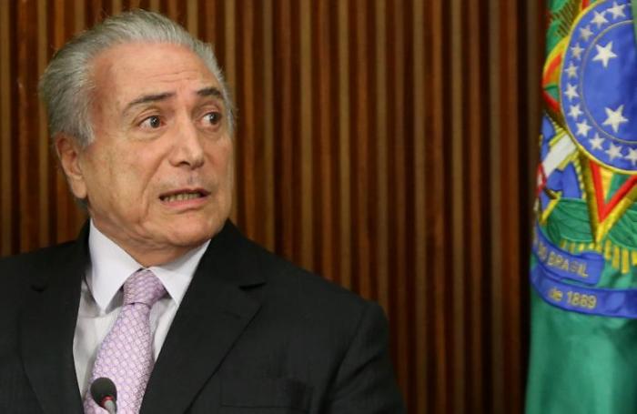 Brazil's President Michel Temer reacts during a meeting with political leaders at Planalto Palace in Brasilia, Brazil, December 5, 2016.