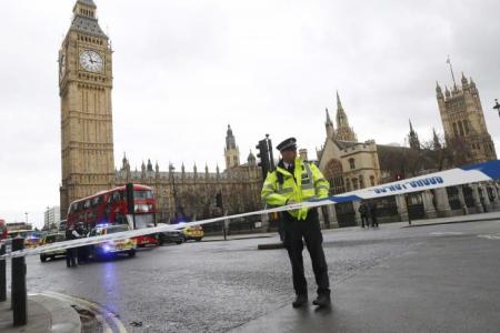 Police tapes off Parliament Square after reports of loud bangs, in London, Britain, March 22, 2017.