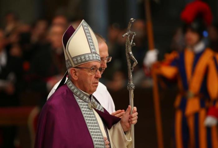 Pope Francis arrives during the penitential celebration in St. Peter's Basilica at the Vatican March 17, 2017.