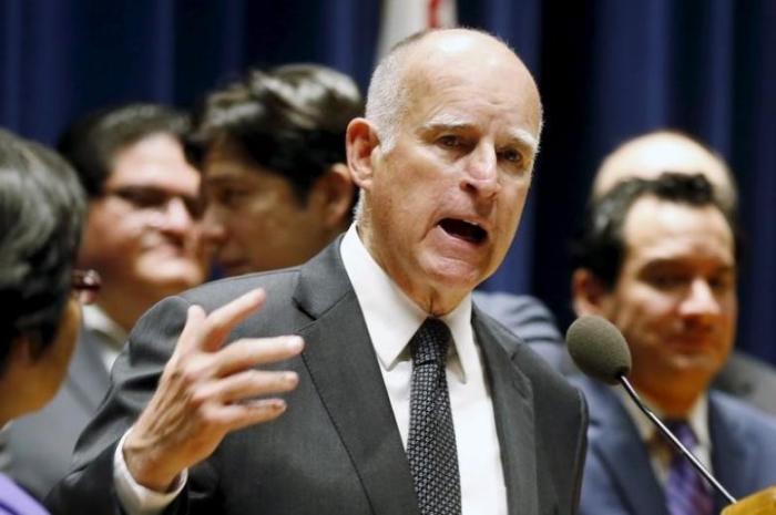 California Governor Jerry Brown speaks before signing a bill hiking California's minimum wage to by 2023 in Los Angeles, California, United States, April 4, 2016.