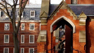 A student stands in the entranceway of a building at Harvard University in Cambridge, Massachusetts, November 16, 2012.