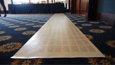 A scroll listing 24,000 legal restrictions in 3-point font that people with criminal records face upon exiting prison, displayed at the National Press Club in Washington, D.C. on March 30, 2017.