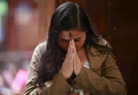 A Catholic faithful participates in the traditional Ash Wednesday service at the 20 de Julio Church in Bogota, Colombia February 10, 2016.