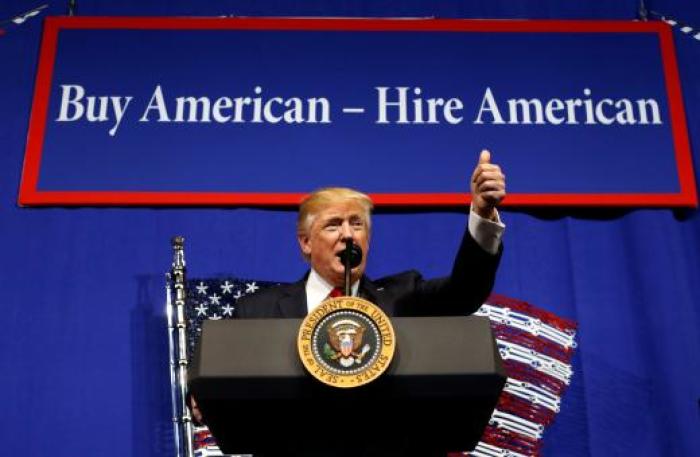 U.S. President Donald Trump speaks before signing an executive order directing federal agencies to recommend changes to a temporary visa program used to bring foreign workers to the United States to fill high-skilled jobs during a visit to the world headquarters of Snap-On Inc, a tool manufacturer, in Kenosha, Wisconsin, U.S., April 18, 2017.