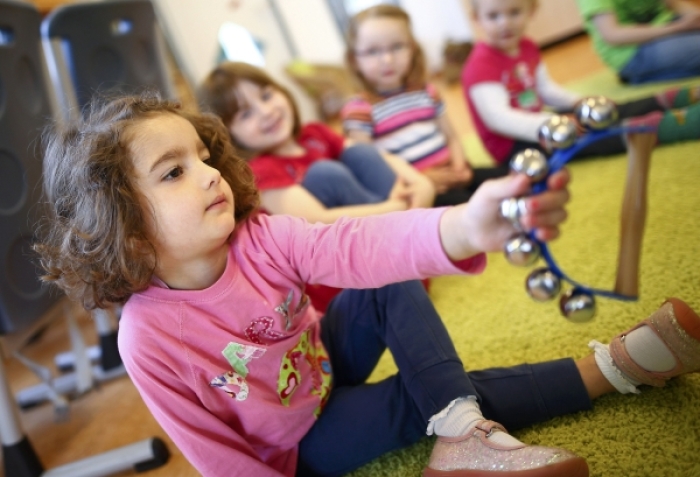 Children play in their kindergarten run by a private foundation which is not affected by the nursery caretakers' strike in Hanau, 30km south of Frankfurt, Germany, May 8, 2015.