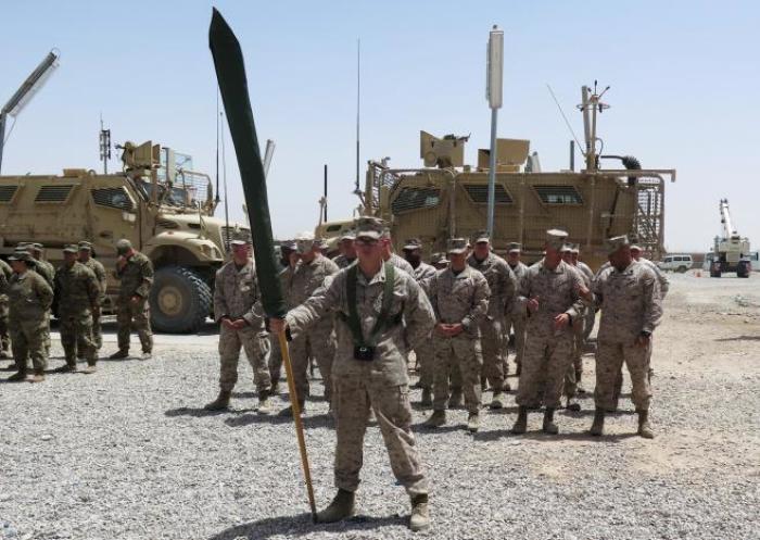 U.S. Marines stand at attention during a transfer of authority ceremony at Shorab camp, in Helmand province, Afghanistan April 29, 2017.