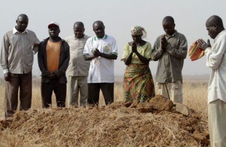 A Christian family mourn three relatives killed by armed Fulani herdsmen in Jos, Plateau state, Nigeria.