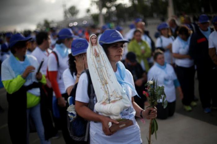 On the day before the arrival of Pope Francis, pilgrims arrive at the Catholic shrine of Fatima, Portugal May 11, 2017.