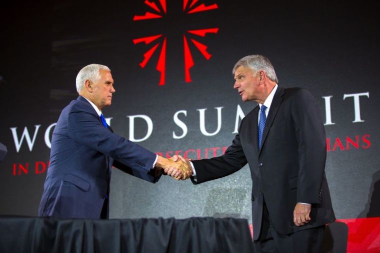 Franklin Graham greets Vice President Mike Pence, who addressed some 600 participants in the World Summit in Defense of Persecuted Christians, Washington D.C. May 11, 2017.