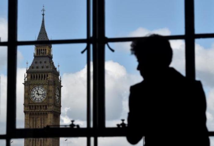 The Big Ben clock tower is seen through a window in London, Britain, April 26, 2017.