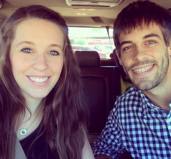 Jill Duggar and Derick Dillard take a selfie while headed towards church.