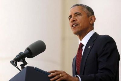 A photo of former U.S. President Barack Obama delivering remarks at the Memorial Day observance at Arlington National Cemetery in Arlington, Virginia in May 2015.