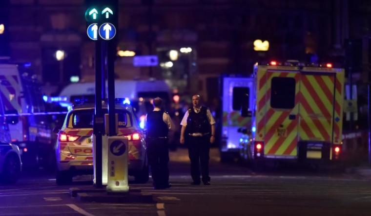 Police attend to an incident on London Bridge in London, Britain, June 3, 2017.