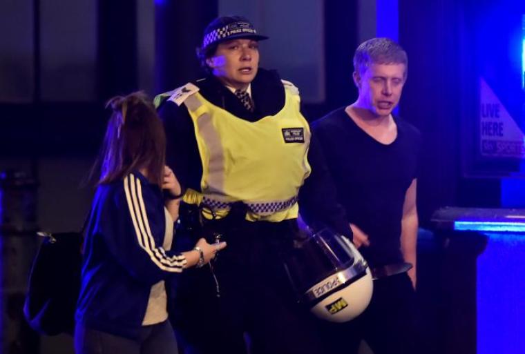 Police attend to an incident on London Bridge in London, Britain, June 3, 2017.