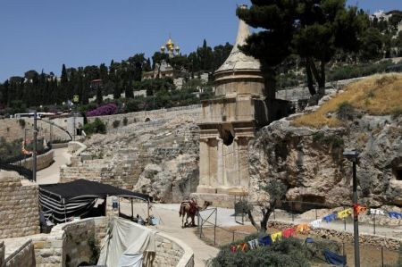 Avshalom's tomb and the Garden of Gethsemane are seen in Jerusalem, 2017.