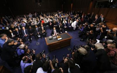 Former FBI Director James Comey is seated prior to testifying before a Senate Intelligence Committee hearing on Russia's alleged interference in the 2016 U.S. presidential election on Capitol Hill in Washington, U.S., June 8, 2017.