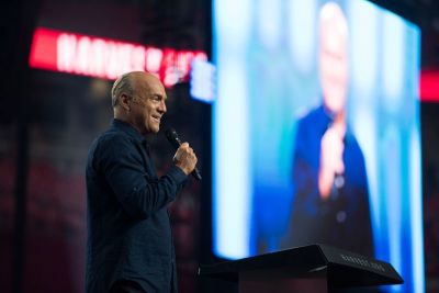 Pastor Greg Laurie preaches at Harvest America at the University of Phoenix Stadium on June 11, 2017.