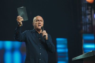 Pastor Greg Laurie preaches at Harvest America at the University of Phoenix Stadium on June 11, 2017.