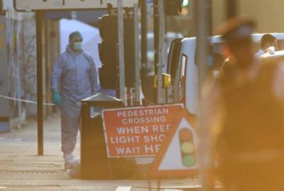 Forensic and police officers attend to the scene after a vehicle collided with pedestrians in the Finsbury Park neighborhood of North London, Britain June 19, 2017.