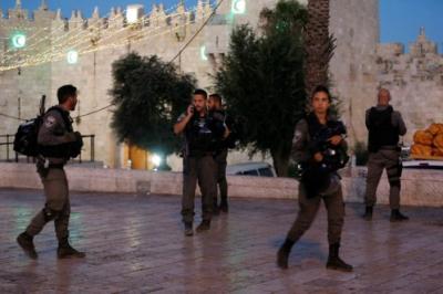 Israeli policemen secure the scene of the shooting and stabbing attack outside Damascus gate in Jerusalem's old city June 16, 2017. Both ISIS and Hamas claim they were responsible for the attack.