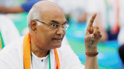 Ram Nath Kovind, nominated presidential candidate of India's ruling Bharatiya Janata Party (BJP), gestures as he attends an International Yoga Day event in New Delhi, India June 21, 2017.