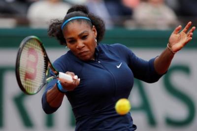 Serena Williams playing against Garbine Muguruza of Spain at the French Open Women's on April 6, 2016. 