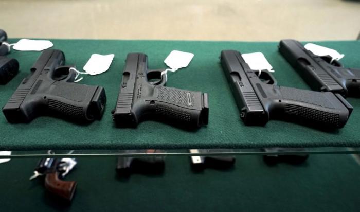 A selection of Glock pistols are seen for sale at the Pony Express Firearms shop in Parker, Colorado December 7, 2015.