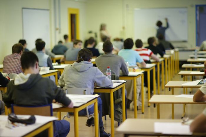 Students seen in a high school classroom.