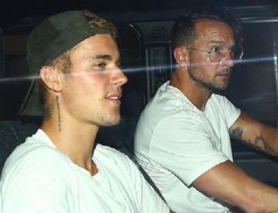 Pop singer Justin Bieber, 23 (L) and Hillsong NYC pastor, Carl Lentz.