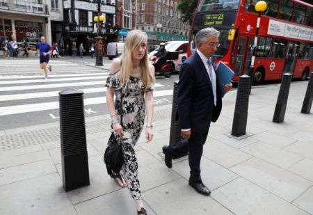 Charlie Gard's mother Connie Yates and her lawyer arrive at the High Court for a hearing on her son's end of life care, in London, Britain July 25, 2017.