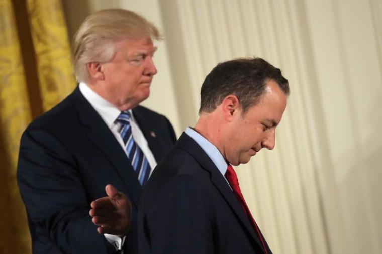 U.S. President Donald Trump congratulates White House Chief of Staff Reince Priebus during a swearing in ceremony for senior staff at the White House in Washington, D.C. January 22, 2017.