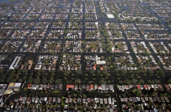 Houses remain surrounded by floodwaters from Hurricane Katrina in New Orleans, Louisiana, September 4, 2005.