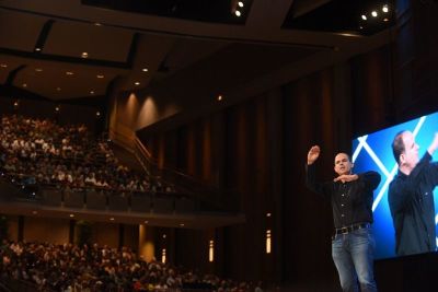 Businessman and investor Marcus Lemonis, star of the reality TV show 'The Profit,' giving remarks at the Willow Creek Community Church's Global Leadership Summit on Thursday, August 10, 2017.