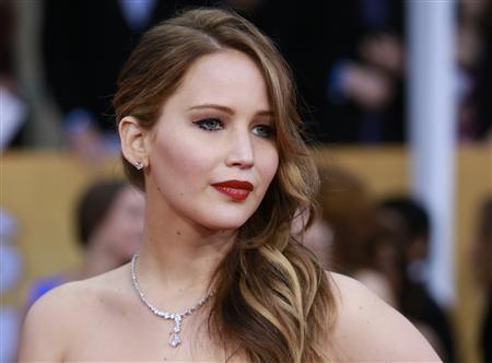 Actress Jennifer Lawrence, from the film 'Silver Linings Playbook,' arrives at the 19th annual Screen Actors Guild Awards in Los Angeles, California January 27, 2013.