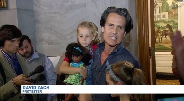 David Zach with his two daughters outside of the Tennessee Capitol, August 14, 2017.