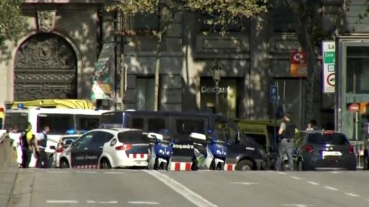 A still image from video shows a police cordon on a street in Barcelona, Spain, following a van crash August 17, 2017.