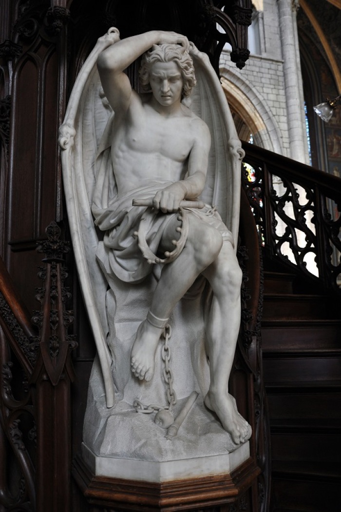 Le génie du mal in its architectural setting at the cathedral in Liège