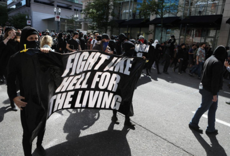 An anti-fascist protester marches during competing demonstrations in Portland, Oregon, U.S. June 4, 2017.