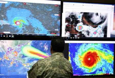 A member of the Emergency Operations Committee (COE) monitors the trajectory of Hurricane Irma in Santo Domingo, Dominican Republic September 5, 2017.