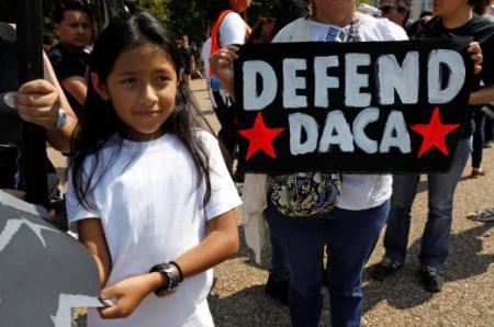 A young kid joined the demonstrators who wants to urge US President Donald Trump to retain the Deferred Action for Childhood Arrivals (DACA) program.