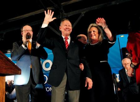 Sebastian Gorka applauds as he campaigns for Republican Alabama Senate candidate Roy Moore in Montgomery on Sept. 21, 2017.