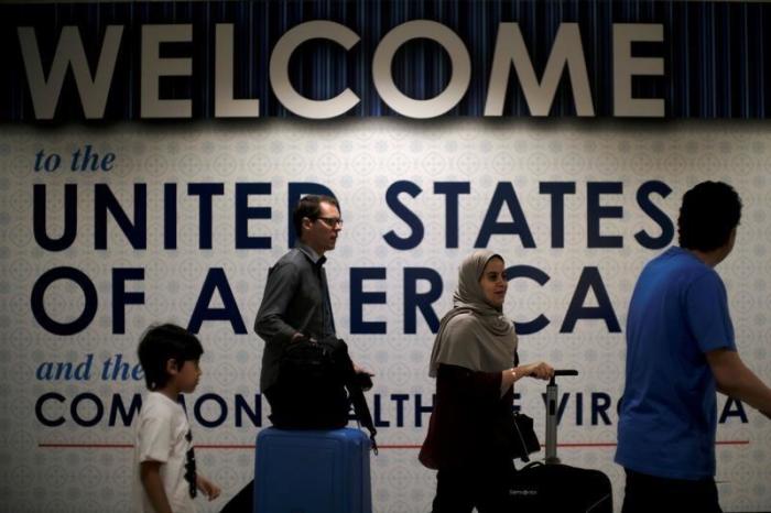 International passengers arrive at Washington Dulles International Airport in Virginia, June 26, 2017.