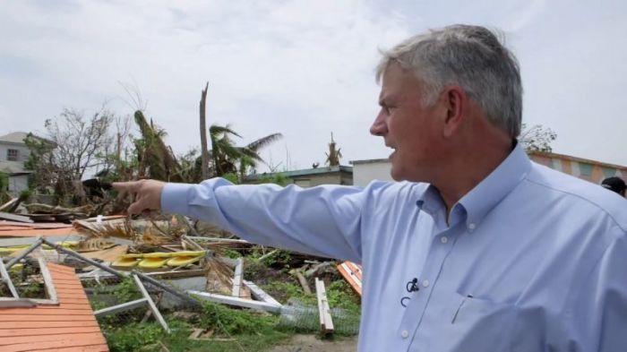 Franklin Graham walking through the island Barbuda as part of Samaritan's Purse relief efforts on September 25, 2017.