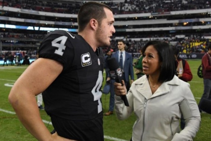 ESPN Monday Night Football sideline reporter Lisa Salters (right) interviews Oakland Raiders quarterback Derek Carr (4) after a NFL International Series game against the Houston Texans at Estadio Azteca, Nov. 21, 2016.